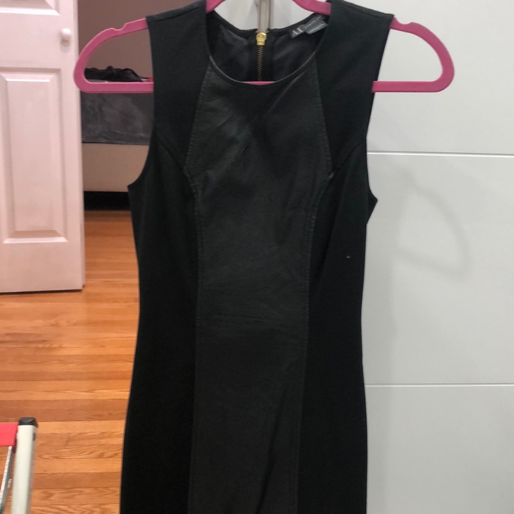 A/X Armani Exchange leather and spandex material, with gold back zipper detail